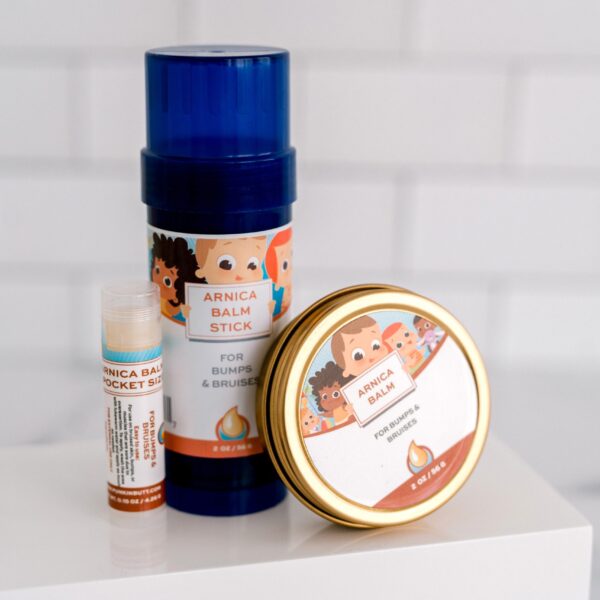 A white table with three different types of cosmetics.